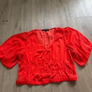 Orange blouse with puffy sleeves